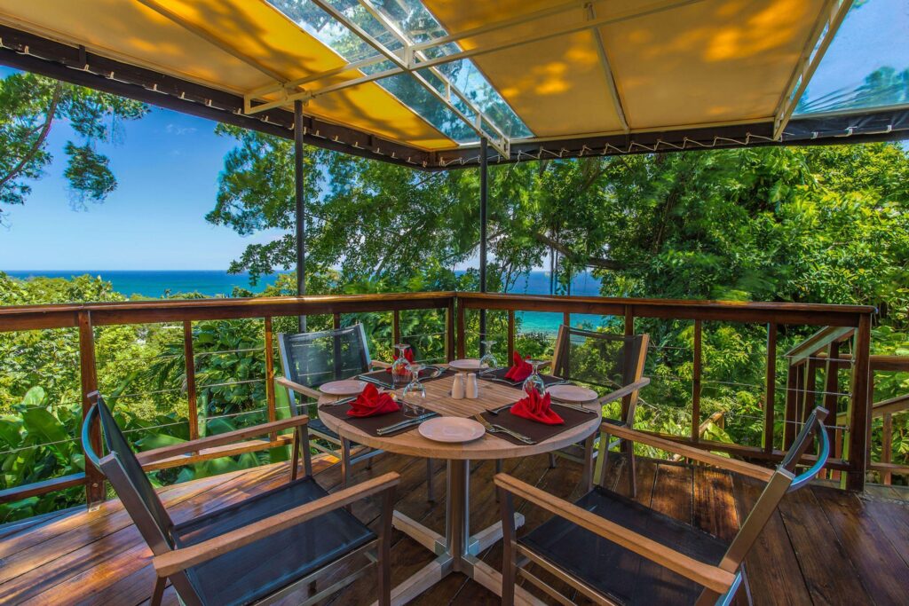 Bushbar at Geejam Port Antonio boutique dining terrace in lush hillside setting