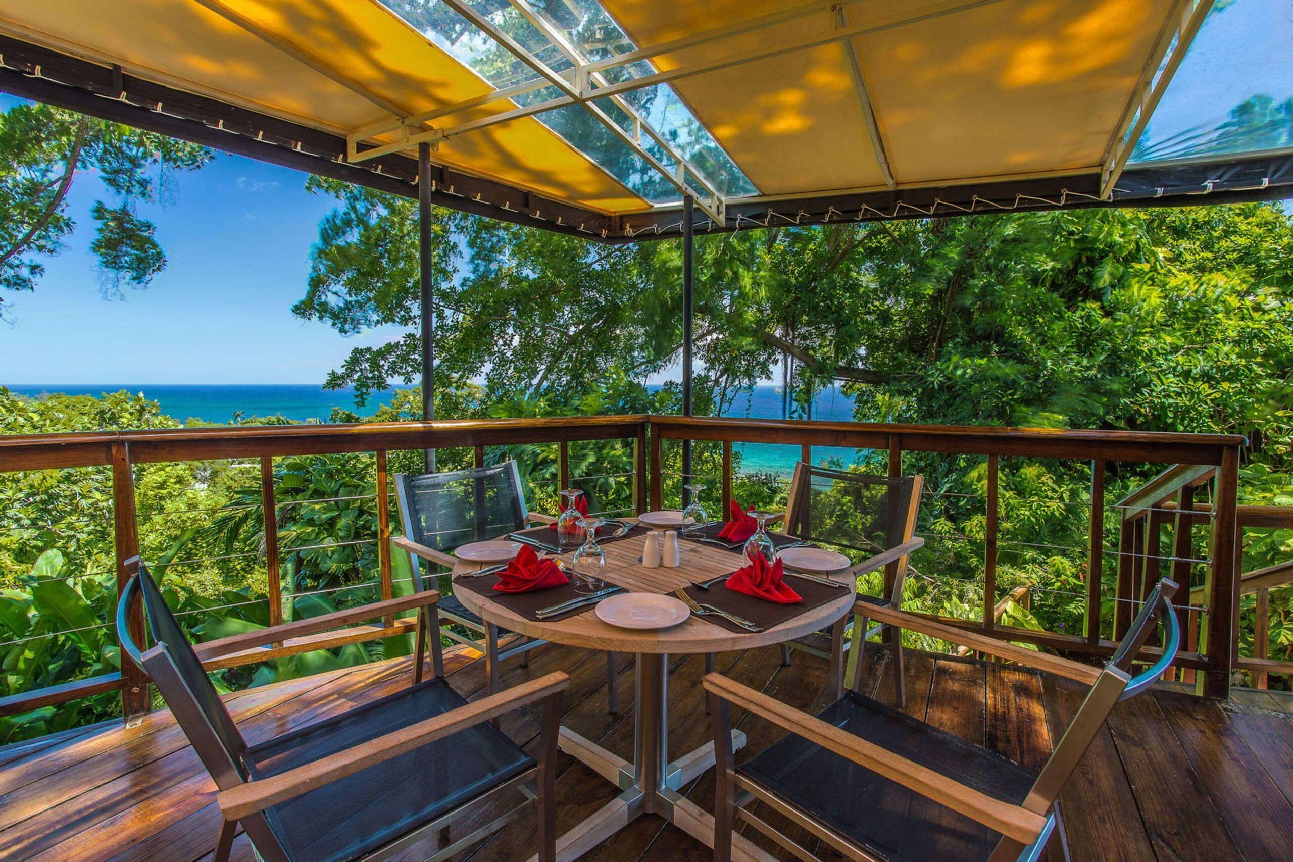 Bushbar at Geejam Port Antonio boutique dining terrace in lush hillside setting