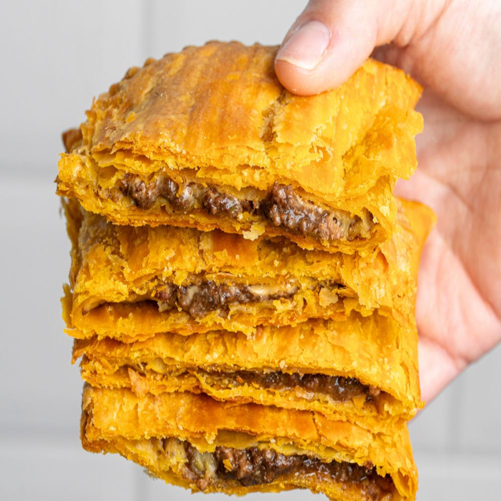 Juici beef patty in Jamaica with deeper color and bolder filling associated with spice and heat