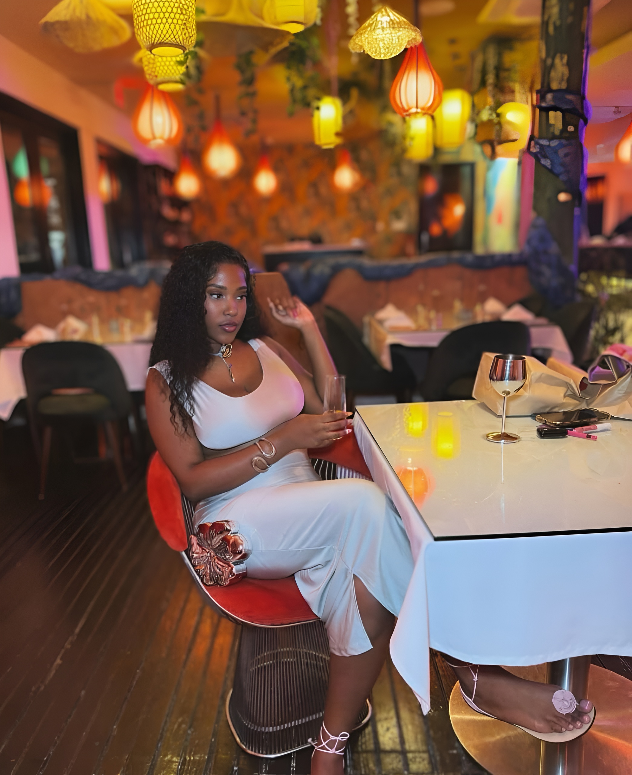 A girl Enjoying her drink at Mystic Thai