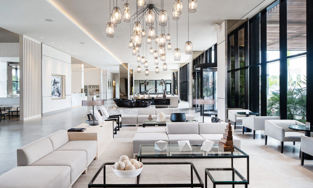 Quiet hotel corridor with soft lighting and minimal design creating a sense of silence and proportion