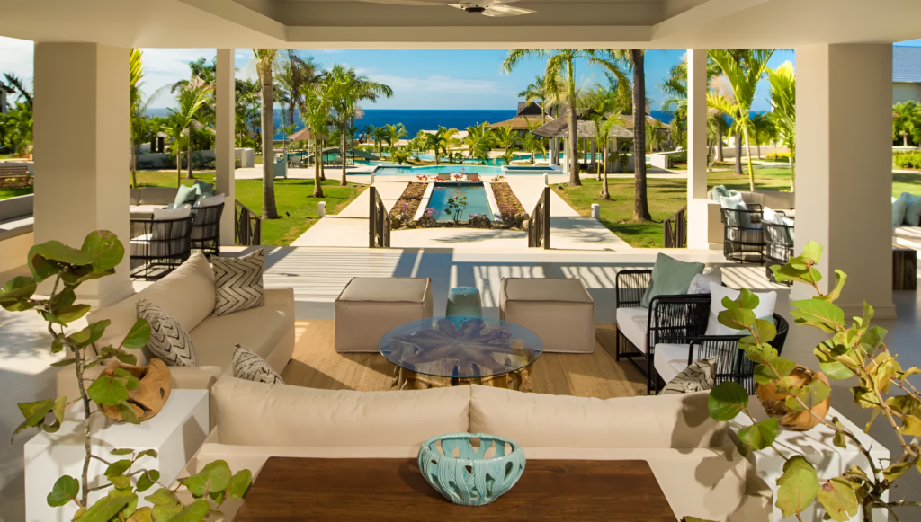 Minimalist luxury hotel lobby with soft lighting and uncluttered design emphasizing calm and restraint