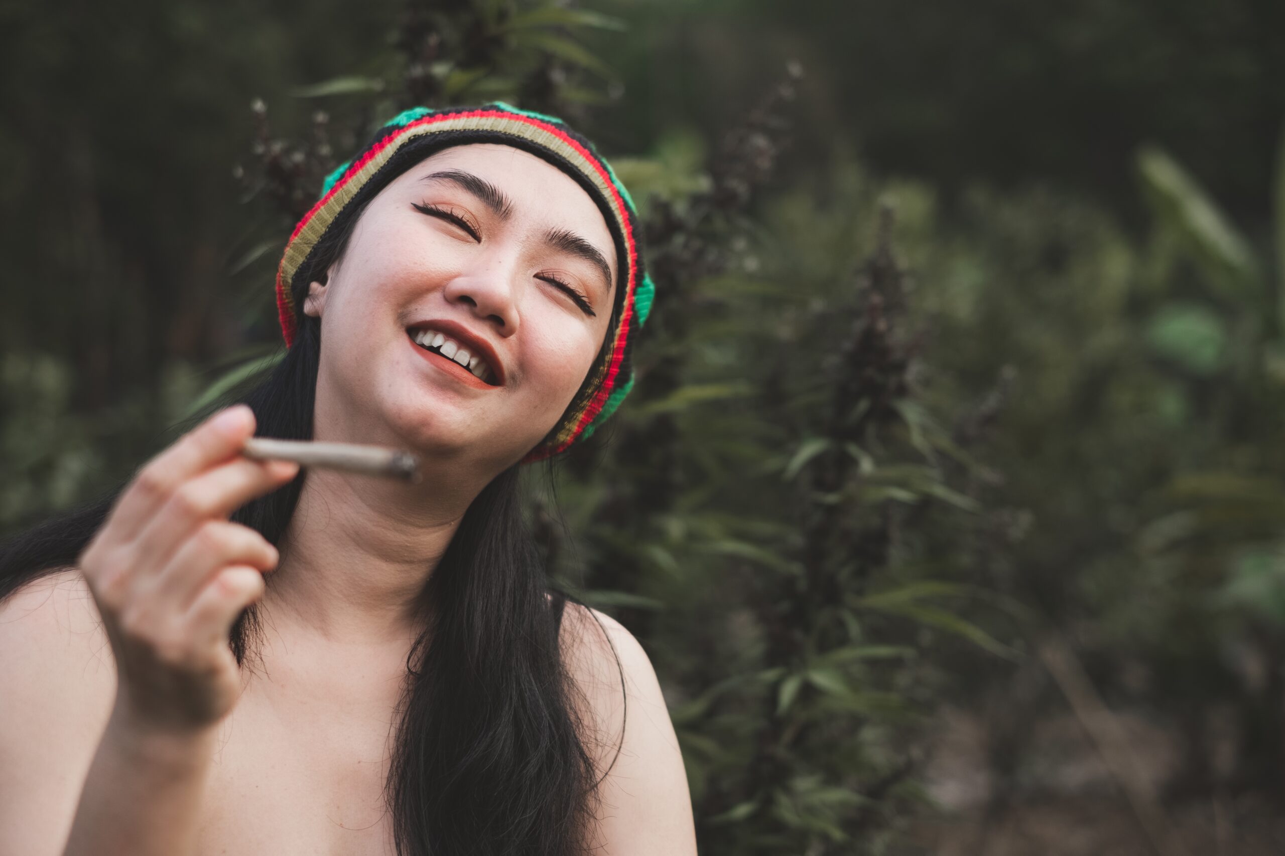 young Asia Woman Smoking Marijuana