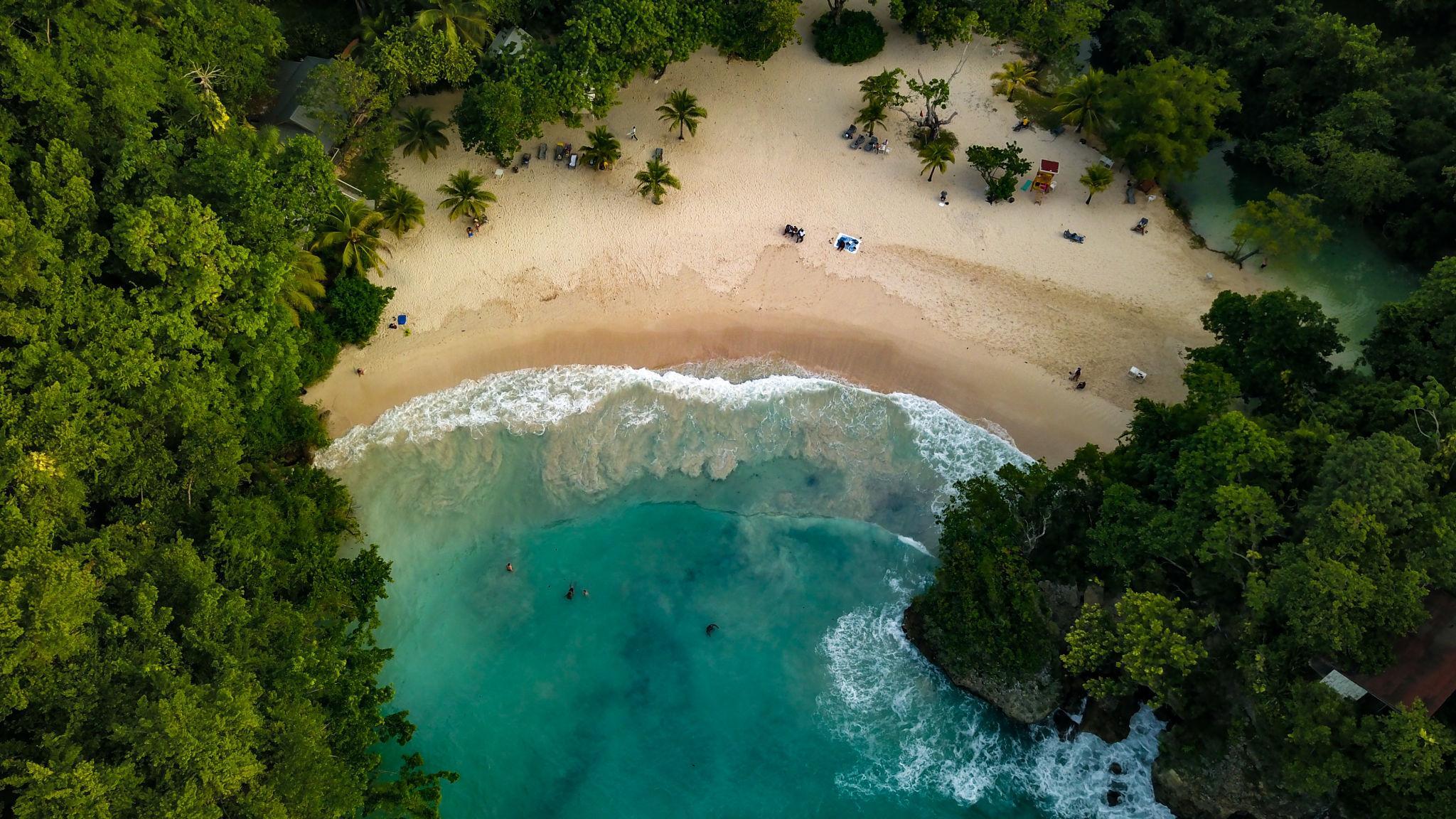 Frenchman’s Cove beach in Port Antonio Jamaica with turquoise water and jungle coastline