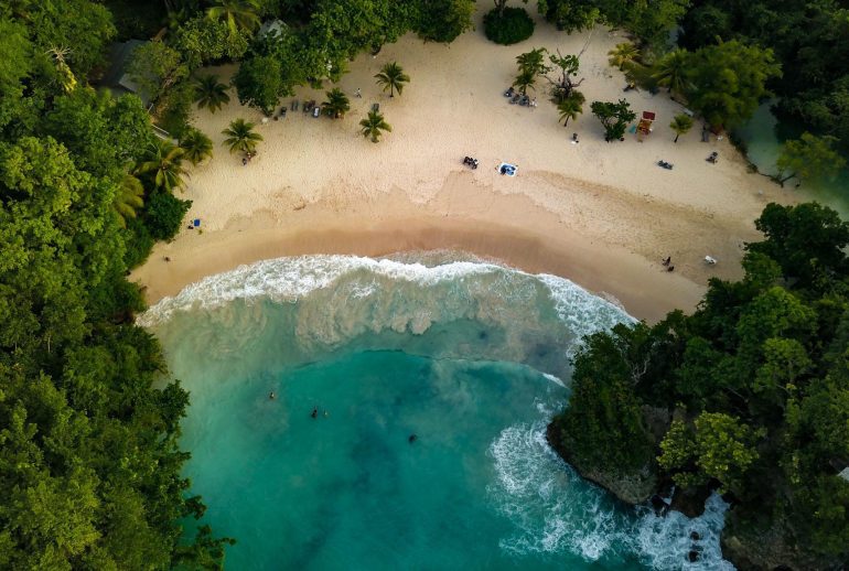 Frenchman’s Cove beach in Port Antonio Jamaica with turquoise water and jungle coastline