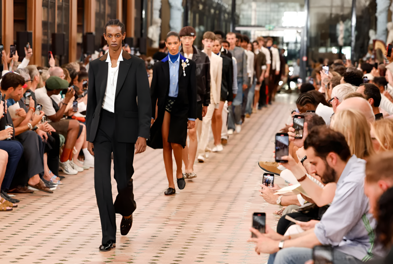 Caribbean designer runway look featuring structured silhouette and modern luxury aesthetic