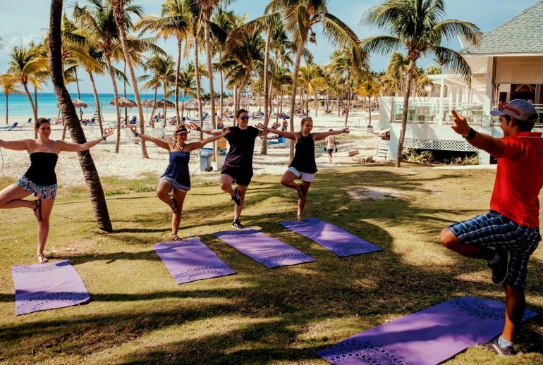 A Caribbean wellness lifestyle captured during a morning walk, reflecting minimal wellness culture and calm luxury wellness