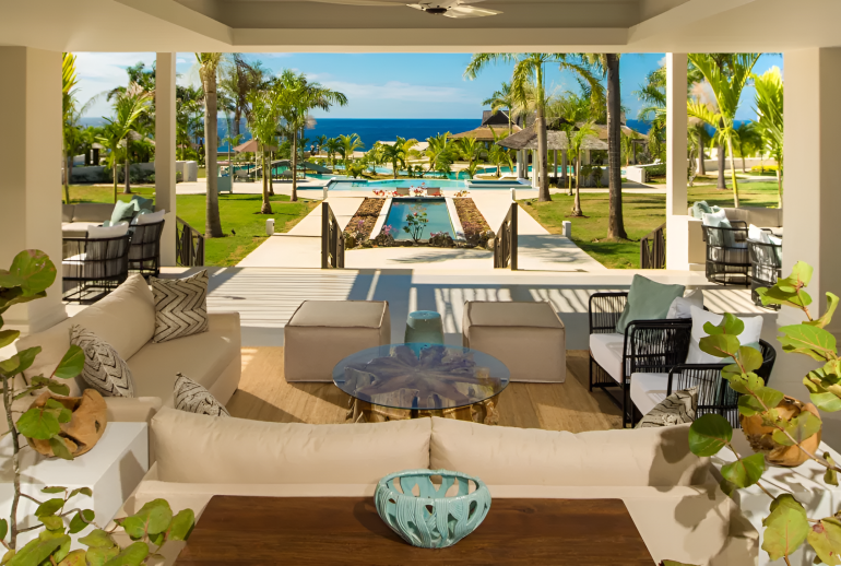 Minimalist luxury hotel lobby with soft lighting and uncluttered design emphasizing calm and restraint